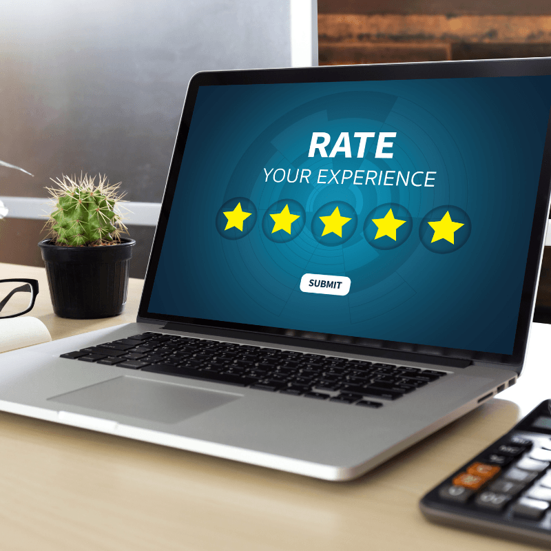 A laptop screen shows a five-star rating survey with Rate Your Experience and a submit button.
