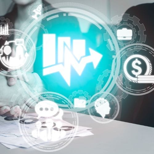 12 Two people shaking hands with finance and business icons and a rising bar graph overlayed in a digital interface.