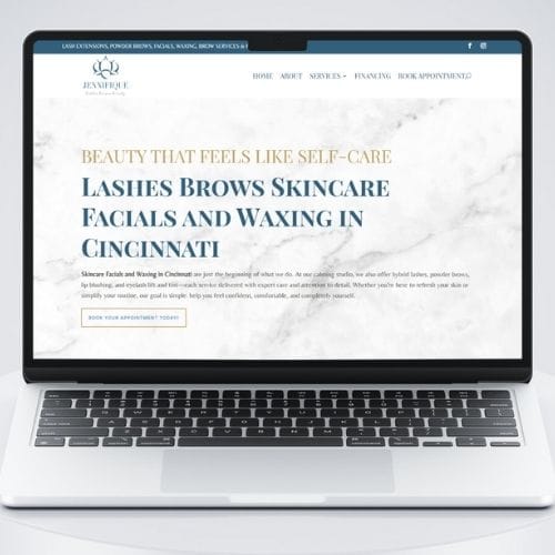Jennifique Portfolio PC A laptop displays a beauty services website offering lashes, brows, skincare, facials, and waxing in Cincinnati.